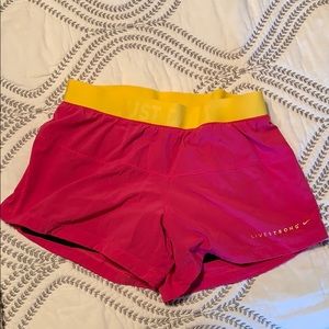 Nike livestrong pink and yellow shorts